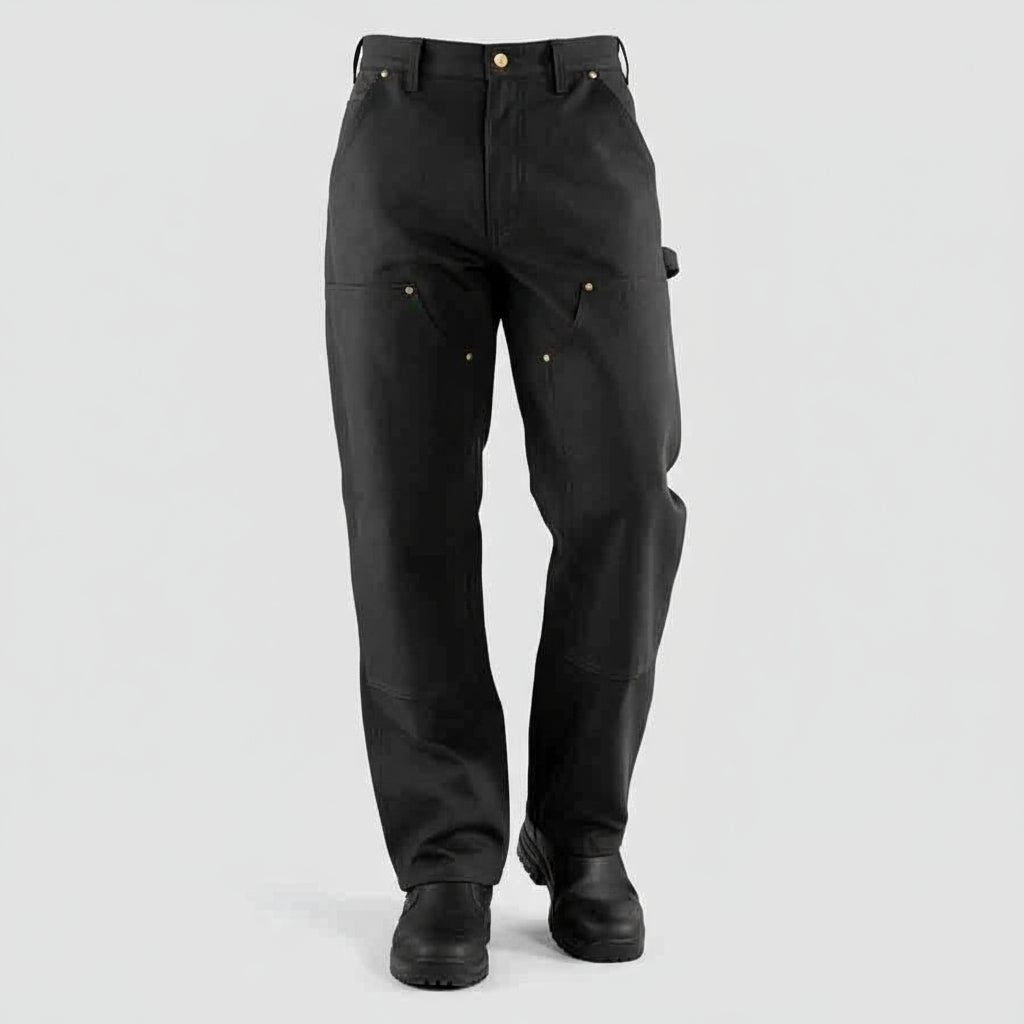 Person wearing black pants on a white background