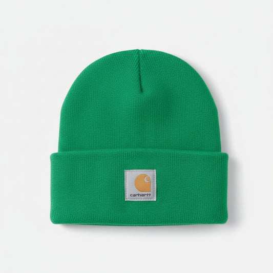 Green knit beanie with Carhartt logo on a white background