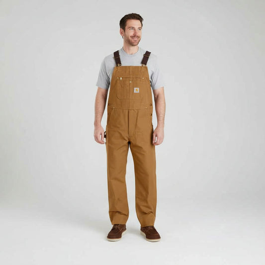 Person wearing brown overalls on a white background