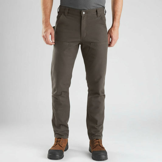 Person wearing green pants on a white background