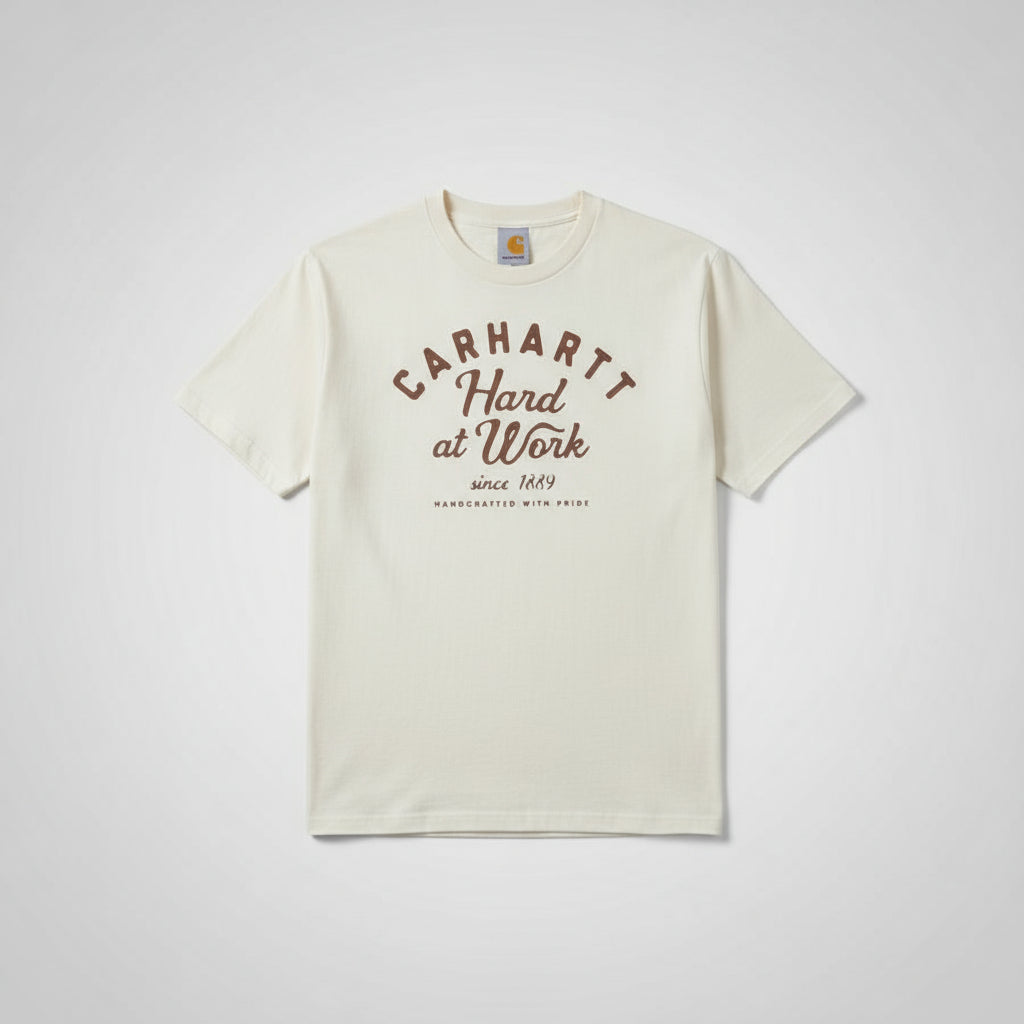 Person wearing a white t-shirt with Carhartt branding and text.